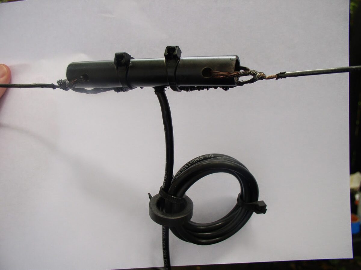 Scrap wood, some wire, four fishing poles and an old tripod:  Moxon Update